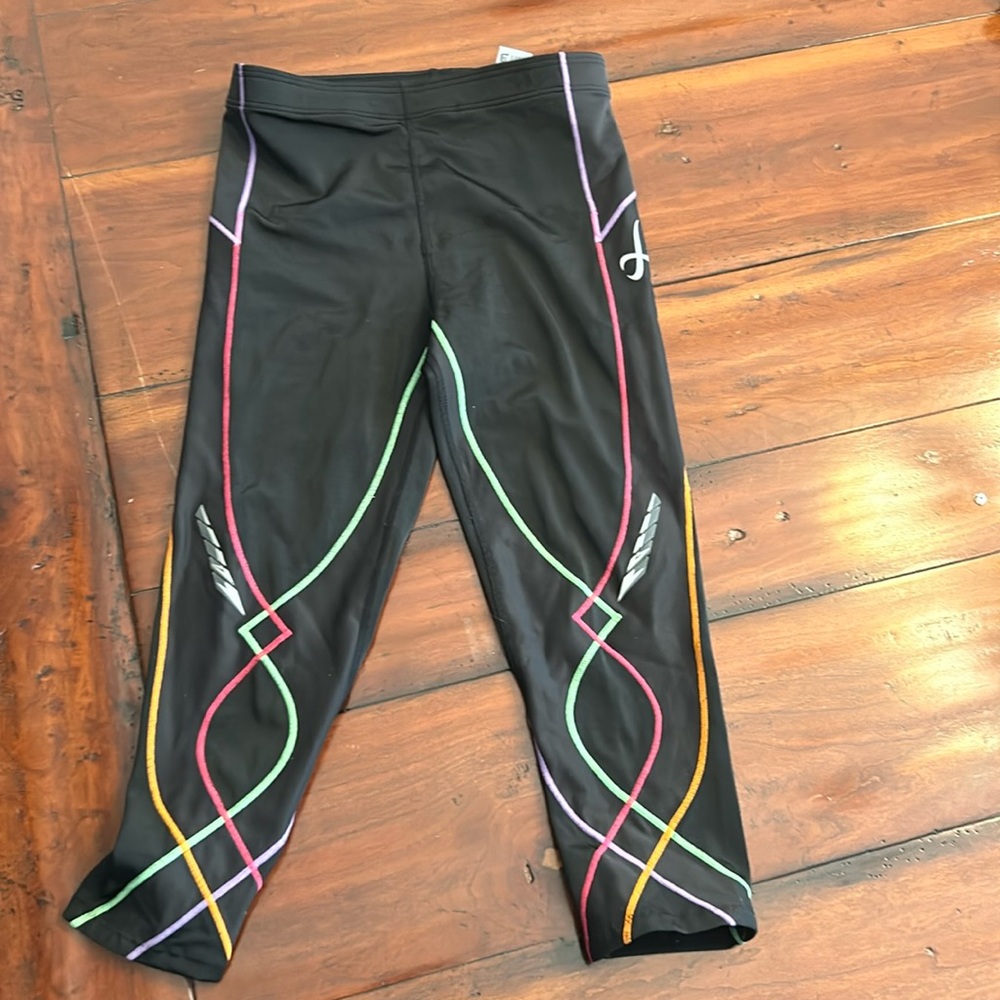 CWX compression capris size M good condition black with colorful design